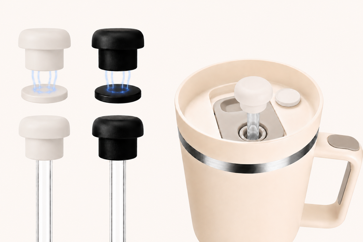Cream insulated 40oz tumbler with reusable magnetic silicone straw cover attached to a clear tumbler straw, shown alongside black and white straw topper caps with magnetic attachment for dust proof hygienic drinking and 10mm–12mm straw compatibility.