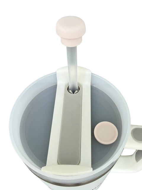 Pearl white magnetic silicone straw cap shown on a tumbler straw, designed as a reusable cover for compatible 10-12 mm tumbler straws.