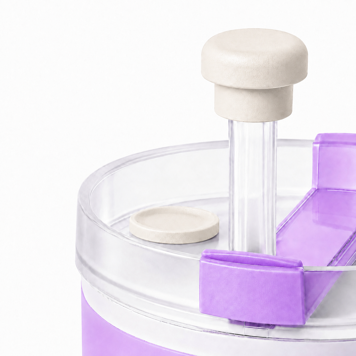 Close-up of a pearl white magnetic silicone straw cap on a tumbler straw with matching reusable straw cover base