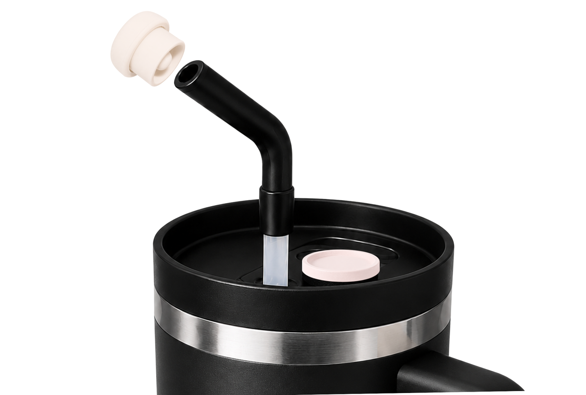 Pearl white magnetic silicone straw cap on a tumbler straw, shown as a reusable straw cover