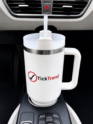 TickTrend 40 oz white insulated tumbler with handle in a vehicle cup holder