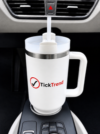 TickTrend 40 oz white insulated tumbler with handle in a vehicle cup holder