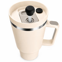 Black silicone magnetic straw topper installed on a 40oz insulated handled tumbler, showing a clean low-profile fit on a reusable drinking straw. Food-grade magnetic straw cover helps shield the straw opening from dust, debris, insects, and everyday contaminants while supporting spill-resistant travel, office, commuting, and outdoor use.